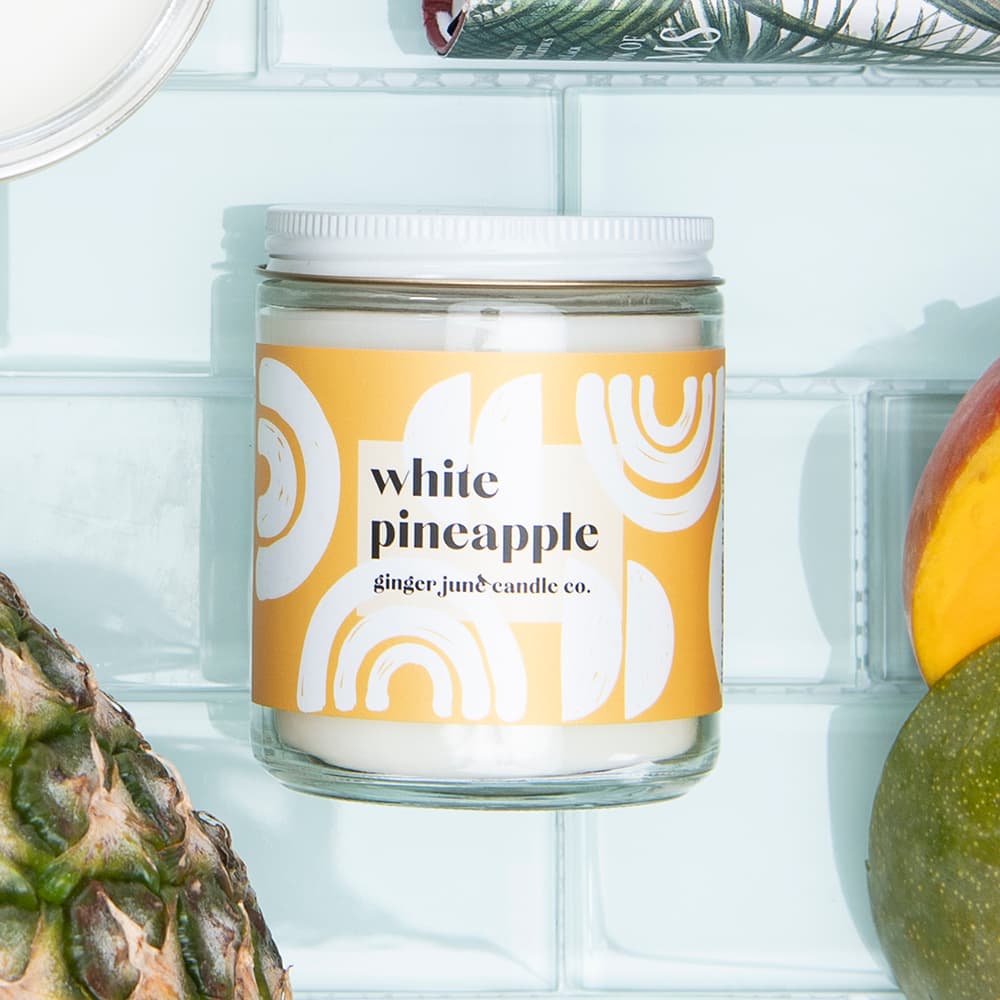 custom candle label shown on a glass candle jar
